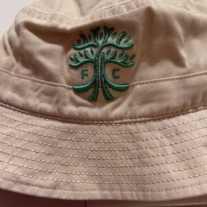 Fan Ink Beige Bucket Hat with Green Tree and Armadillo Logo One Size